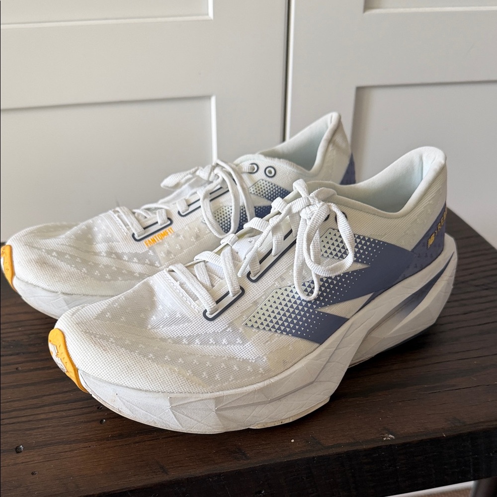 New Balance White and Blue Sneakers